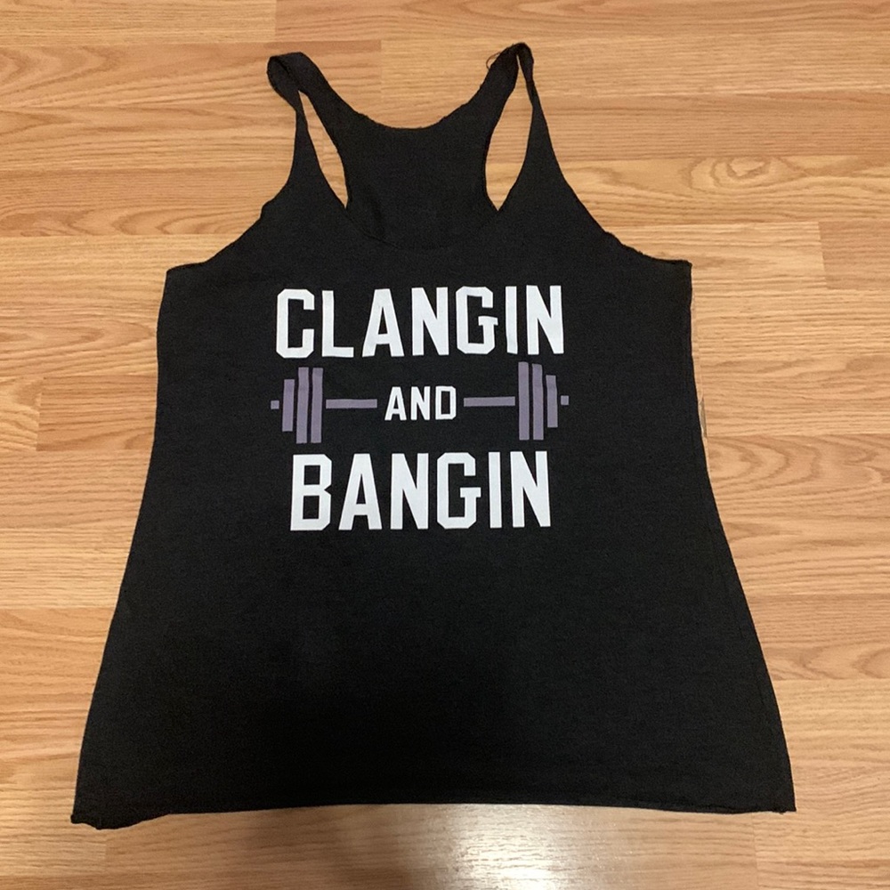 4 workout tanks- size large- excellent condition